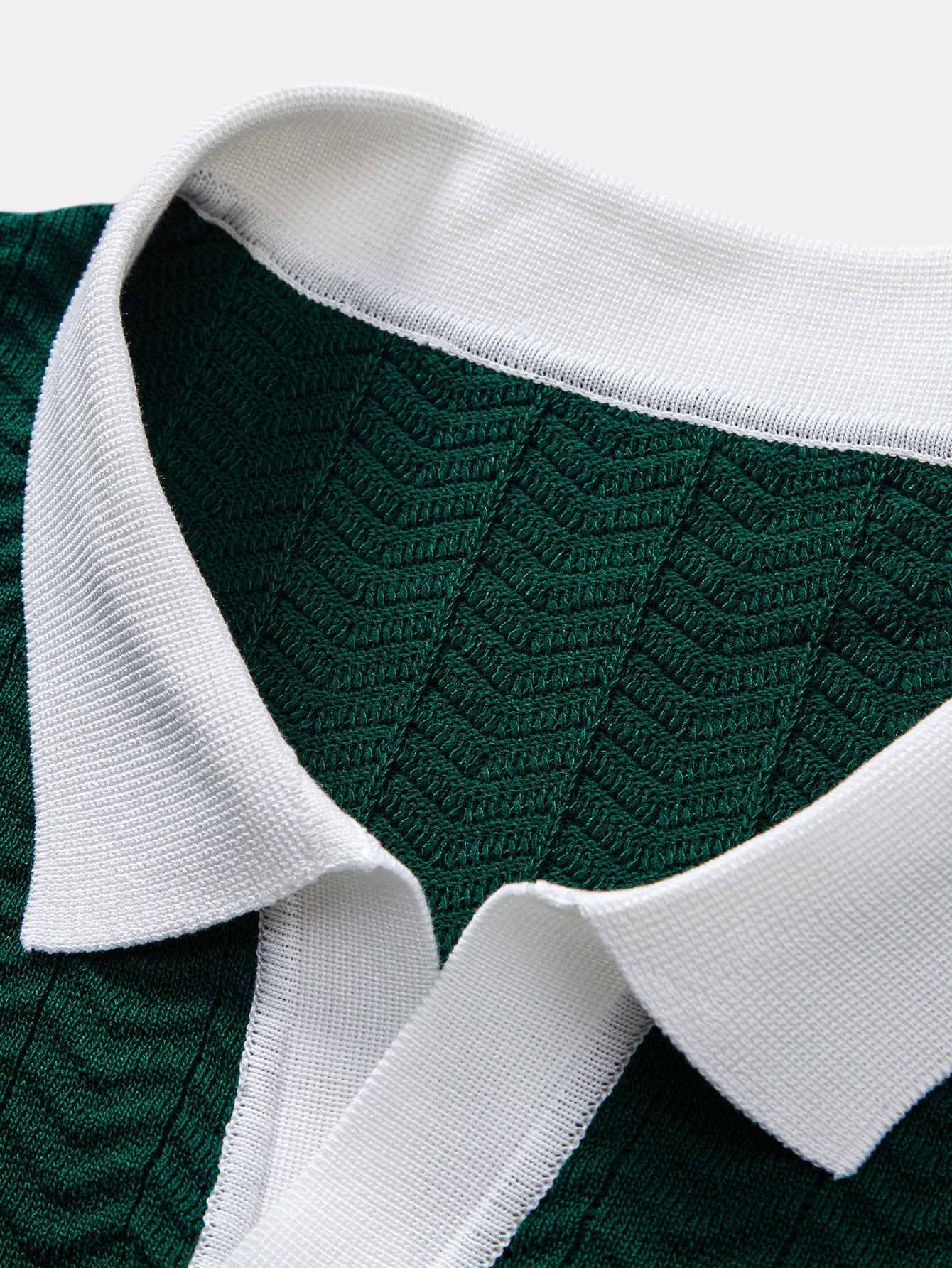 Textured contrast knit polo shirt with V-neck and slim fit trousers