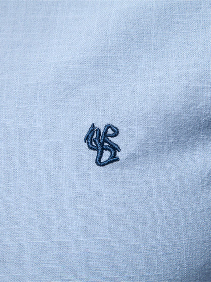 Long-sleeved linen stand-up collar shirt.