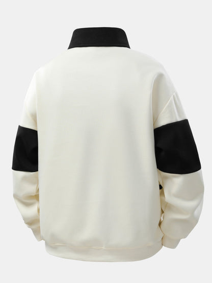 Moletom Polo Patchwork com Blocos de Cor e Caimento Relaxado