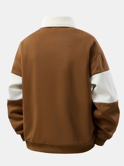 Moletom Polo Patchwork com Blocos de Cor e Caimento Relaxado