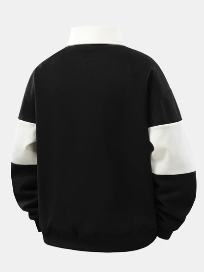 Moletom Polo Patchwork com Blocos de Cor e Caimento Relaxado